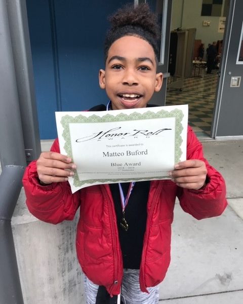 Matteo winning the Honor Roll award