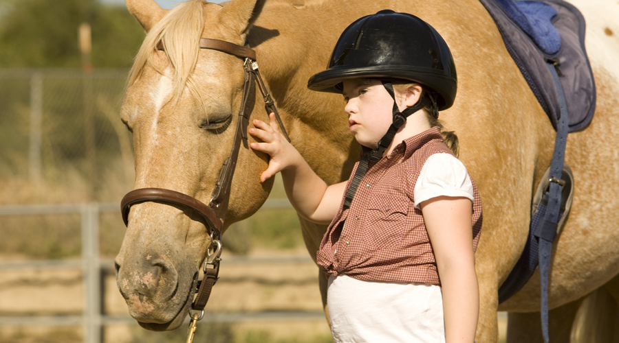 11Carlianne with her horse in the UCP Saddlepals program